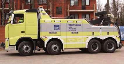 Фото эвакуатора грузовых автомобилей с частичной погрузкой автомобиля Volvo FH 8x4 EMPL